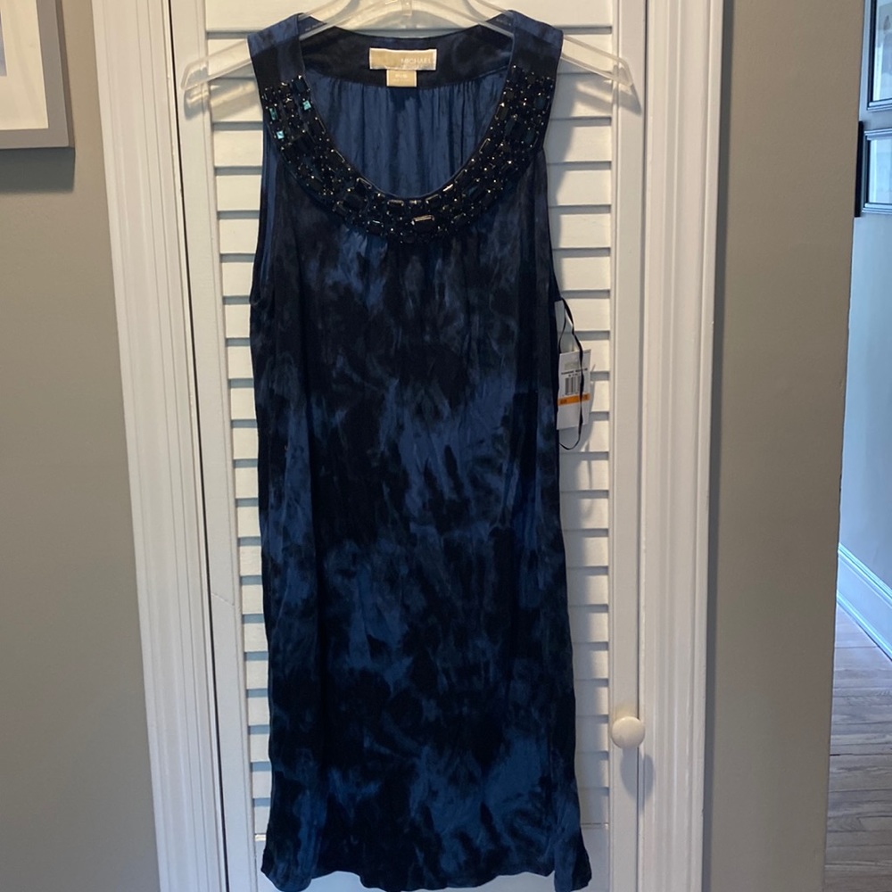 Adorable, comfortable dress with front neck embellishments